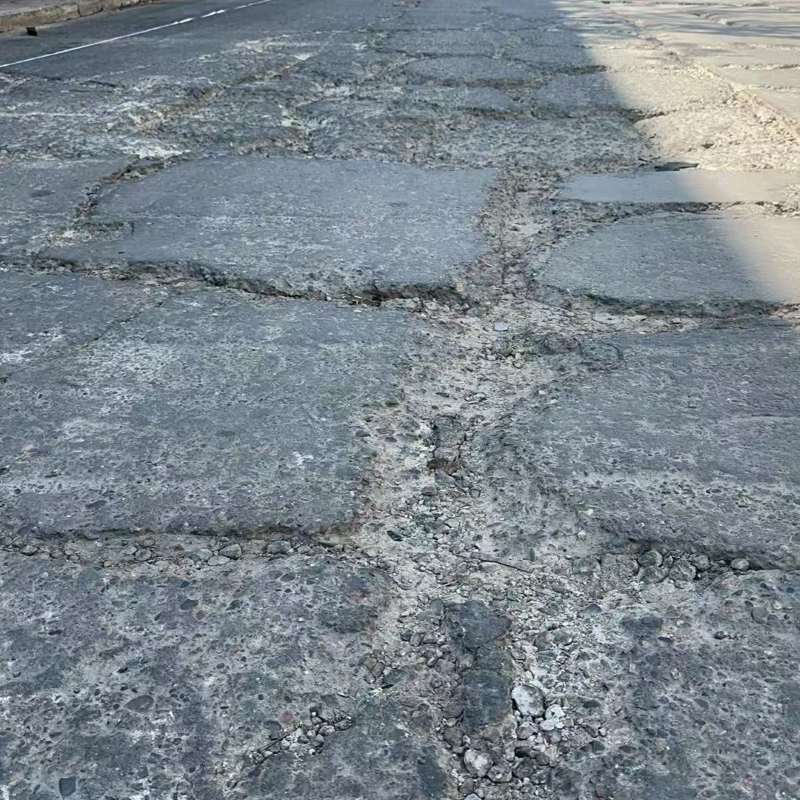 右江路面起砂露石子修补料